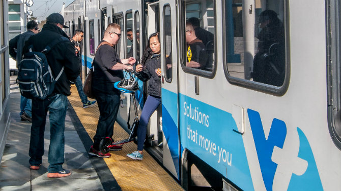 People boarding VTA light rail